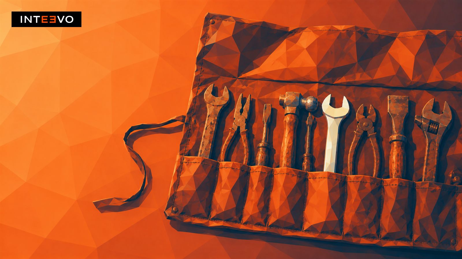 an opened tool roll of worn tools with one new tool.